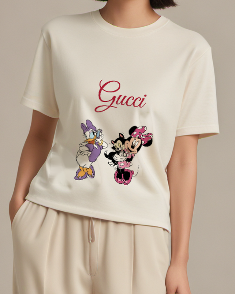 Ivory Daisy Duck Holding Phone Minnie With Cat Graphic T-Shirt - model wearing view