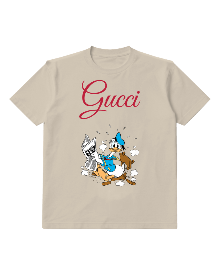 Beige Duck Amid Scattered Papers Graphic T-Shirt - front product view