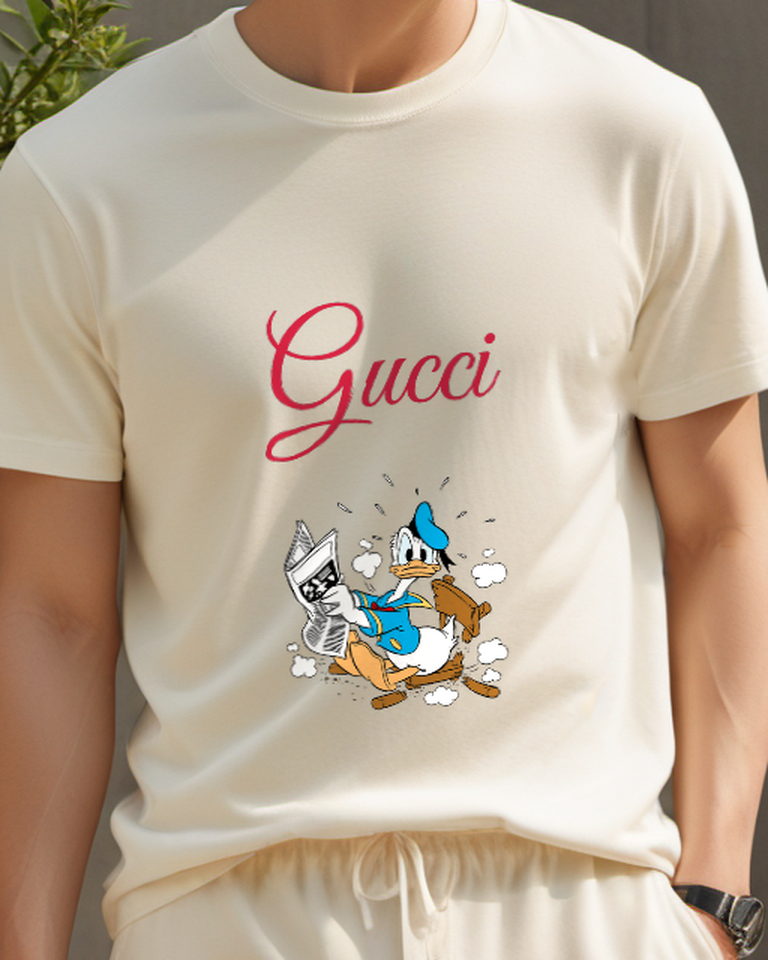 Beige Duck Amid Scattered Papers Graphic T-Shirt - model wearing view