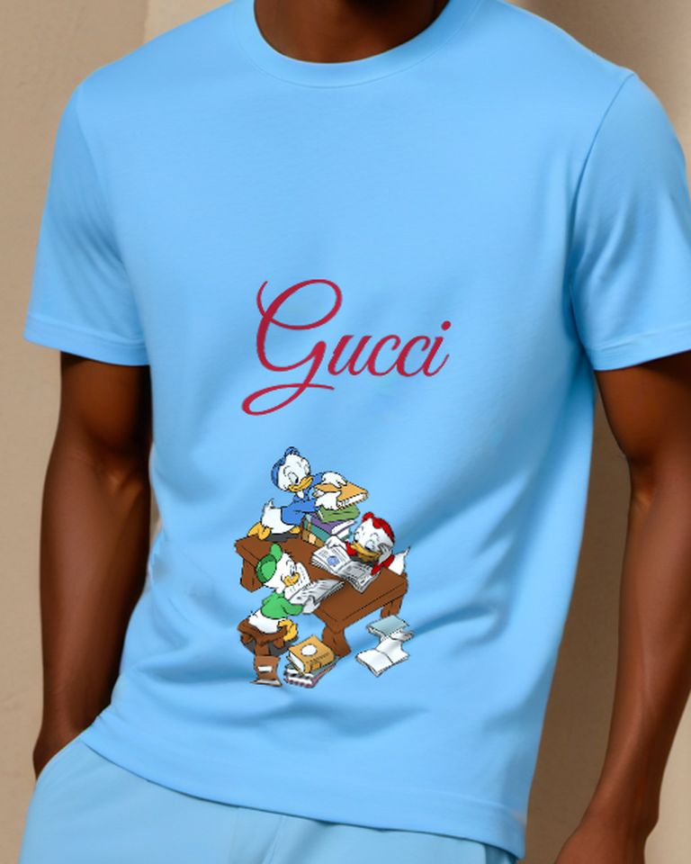 Sky Blue Three Ducklings Study Together At Desk Graphic T-Shirt - model wearing view