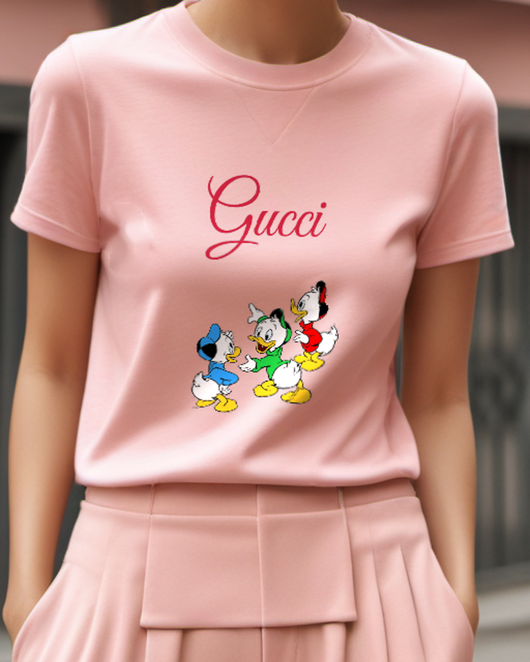 Blush Pink Three Ducklings In Colorful Outfits Graphic T-Shirt - model wearing view