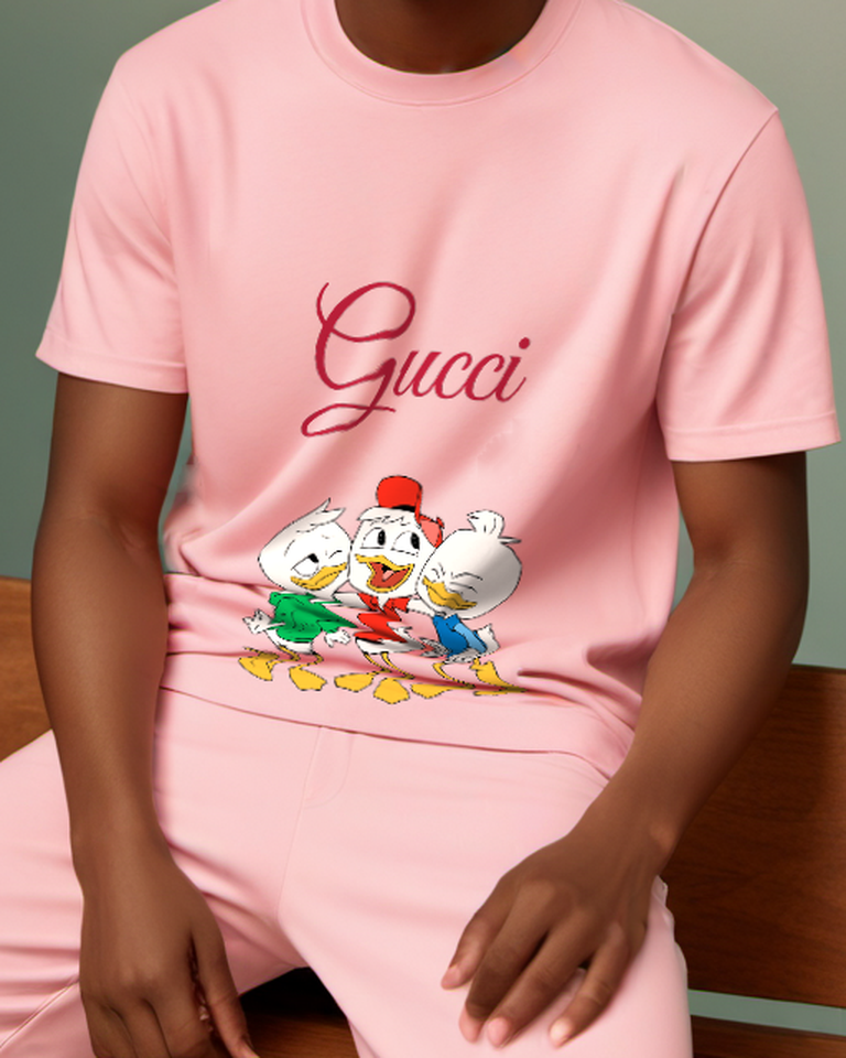 Blush Pink Three Ducklings In Joyful Poses Graphic T-Shirt - model wearing view